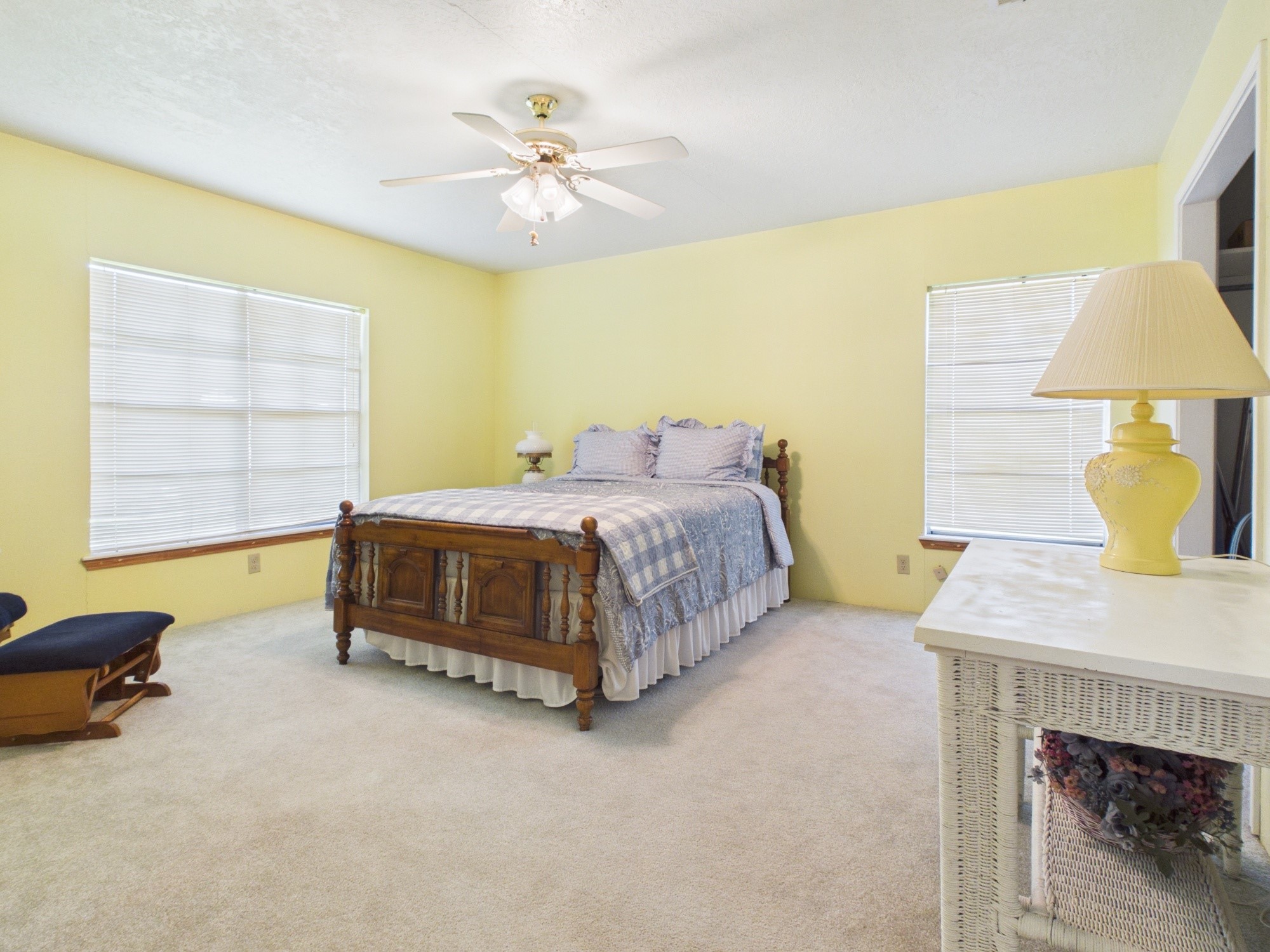 12 Harding Road Huntsville, TX 77340 - Photo 15 of 20 a bedroom with a bed and a table