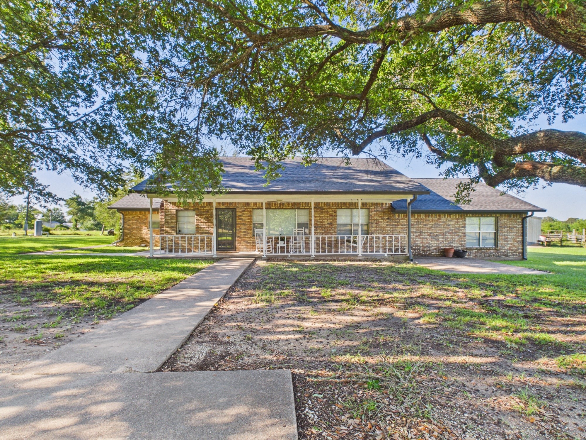 12 Harding Road Huntsville, TX 77340 - Photo 2 of 20 a view of a yard in front of a house