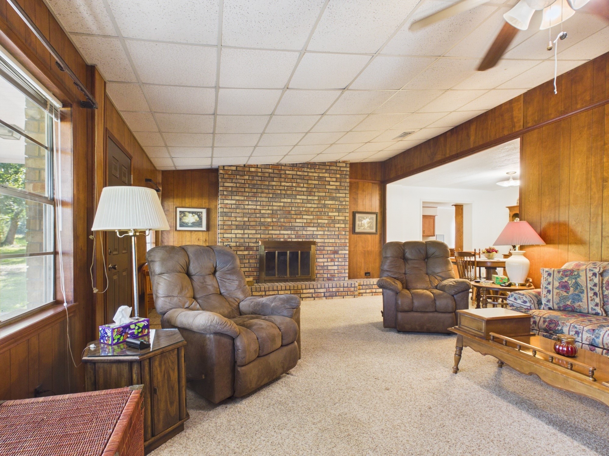 12 Harding Road Huntsville, TX 77340 - Photo 10 of 20 a living room with furniture and a fireplace