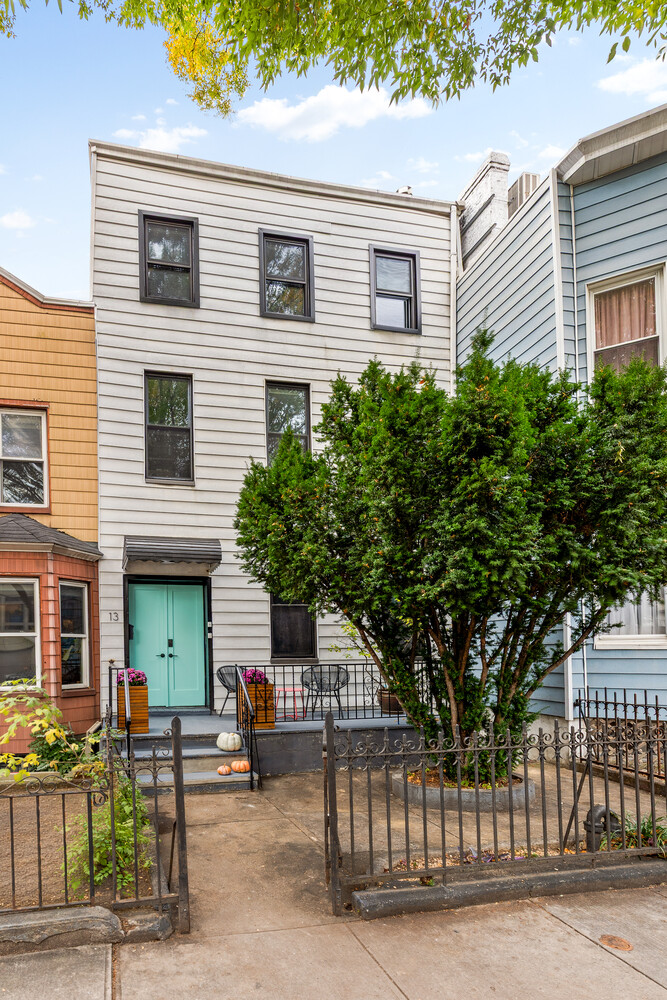 13 Reeve Place Brooklyn, NY 11218 - Photo 13 of 14 a front view of a house with stairs