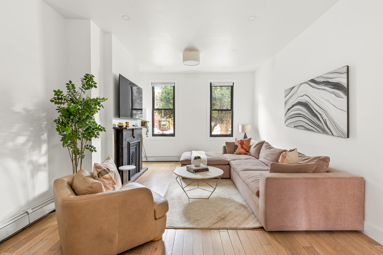 13 Reeve Place Brooklyn, NY 11218 - Photo 3 of 14 a living room with furniture potted plant and a window