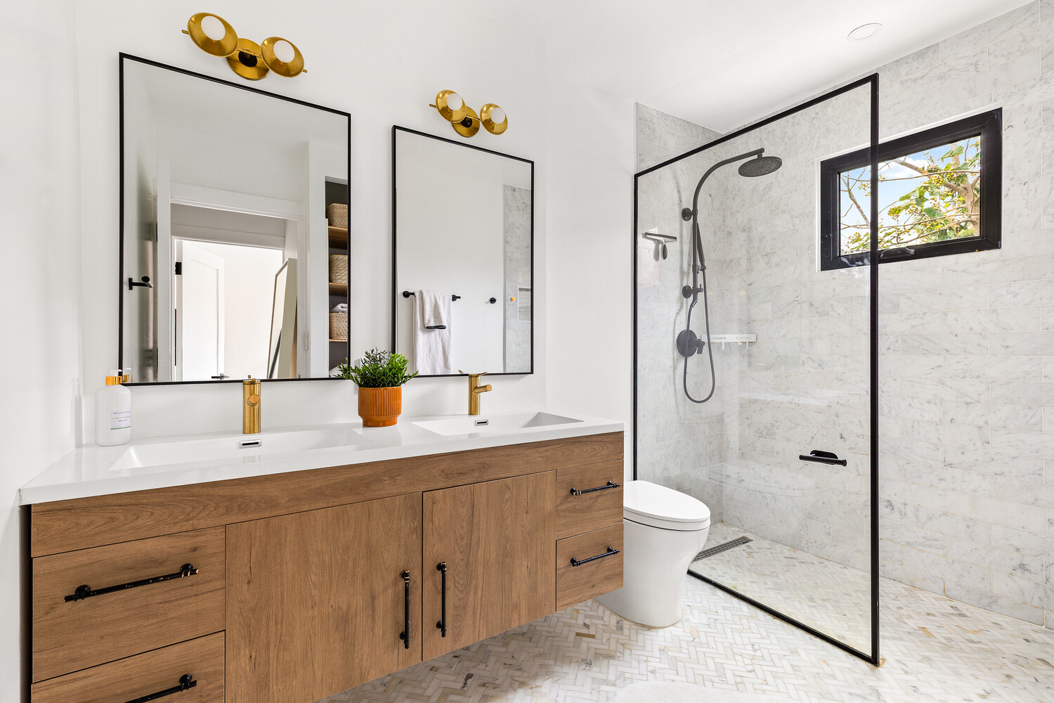 13 Reeve Place Brooklyn, NY 11218 - Photo 6 of 14 a bathroom with a double vanity sink toilet mirror and shower