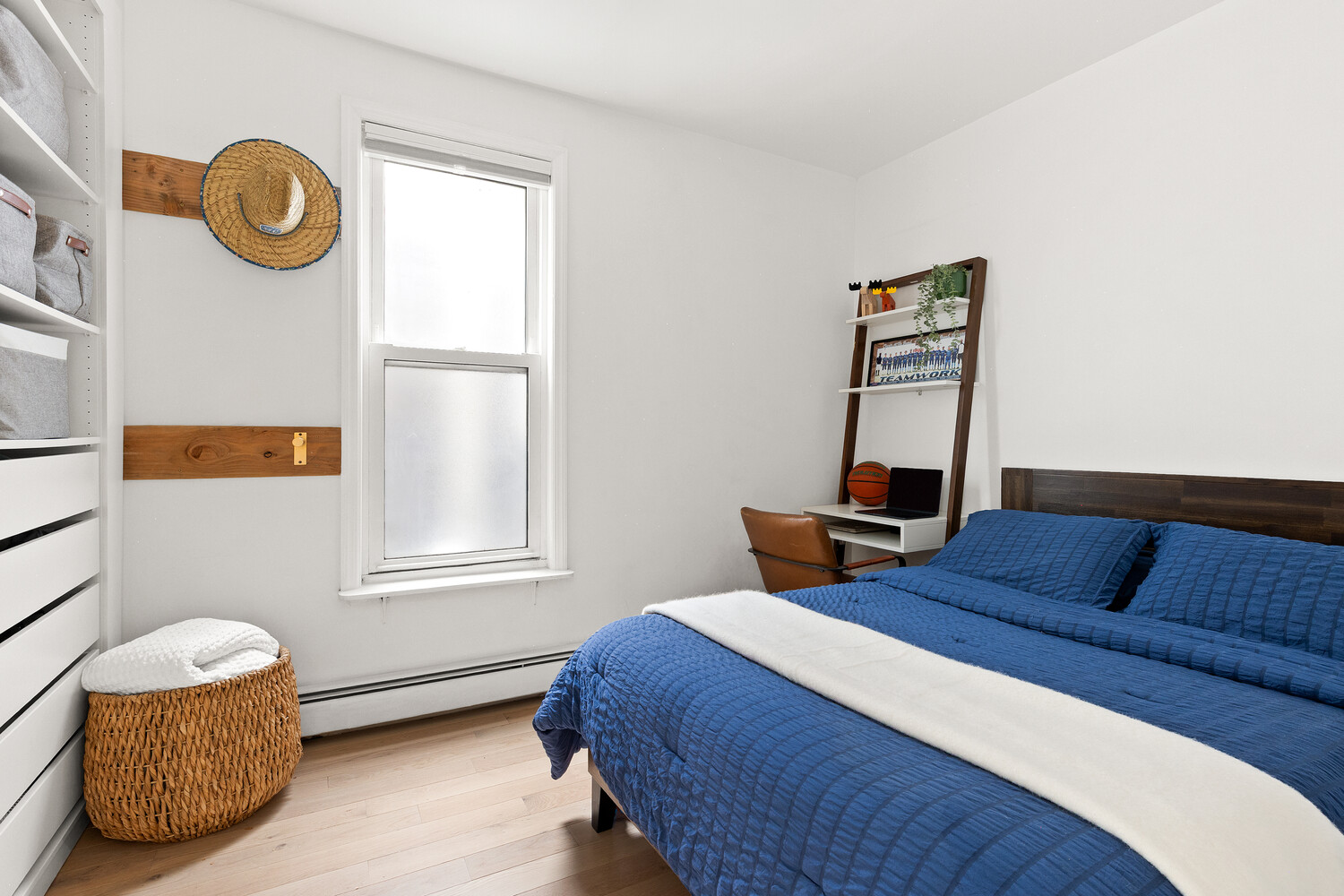 13 Reeve Place Brooklyn, NY 11218 - Photo 7 of 14 a bedroom with bed and a window