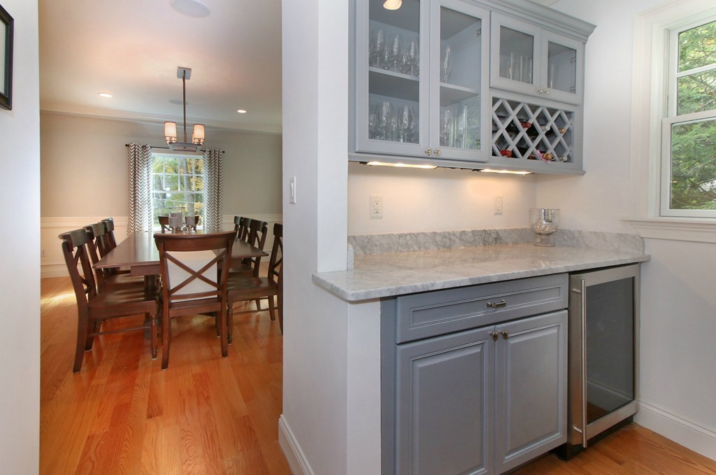 21 Cypress Road Wellesley, MA 02481 - Photo 8 of 23 a dining hall with stainless steel appliances granite countertop a stove and a wooden floors
