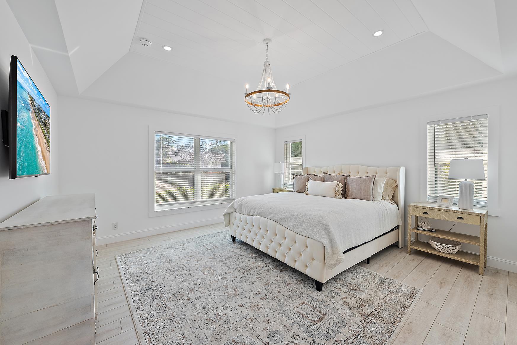 491 Sunset Way Juno Beach, FL 33408 - Photo 22 of 50 a bed room with a bed and a window