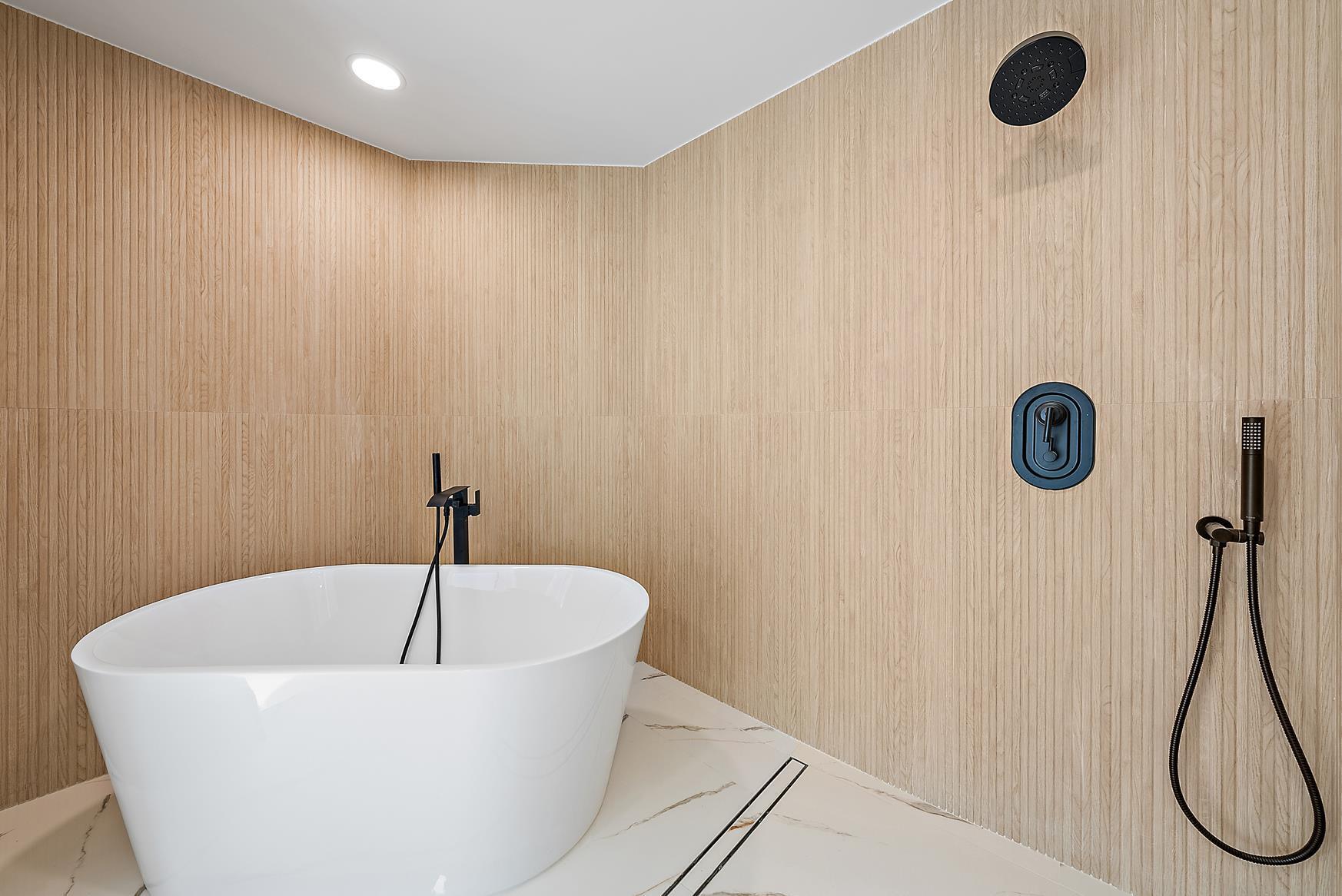 491 Sunset Way Juno Beach, FL 33408 - Photo 26 of 50 a bathroom with a tub and a shower