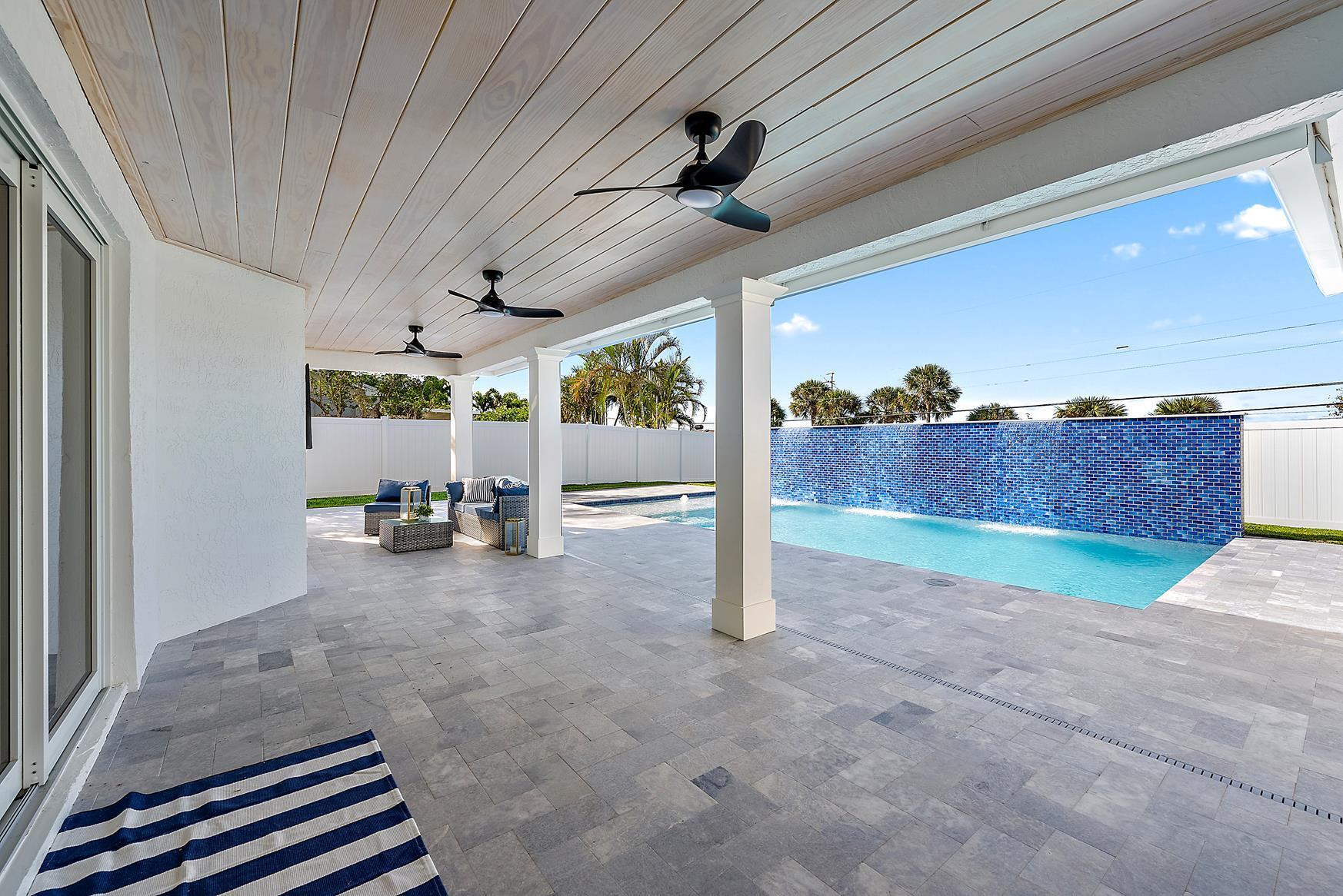 491 Sunset Way Juno Beach, FL 33408 - Photo 33 of 50 a view of a room with a slide