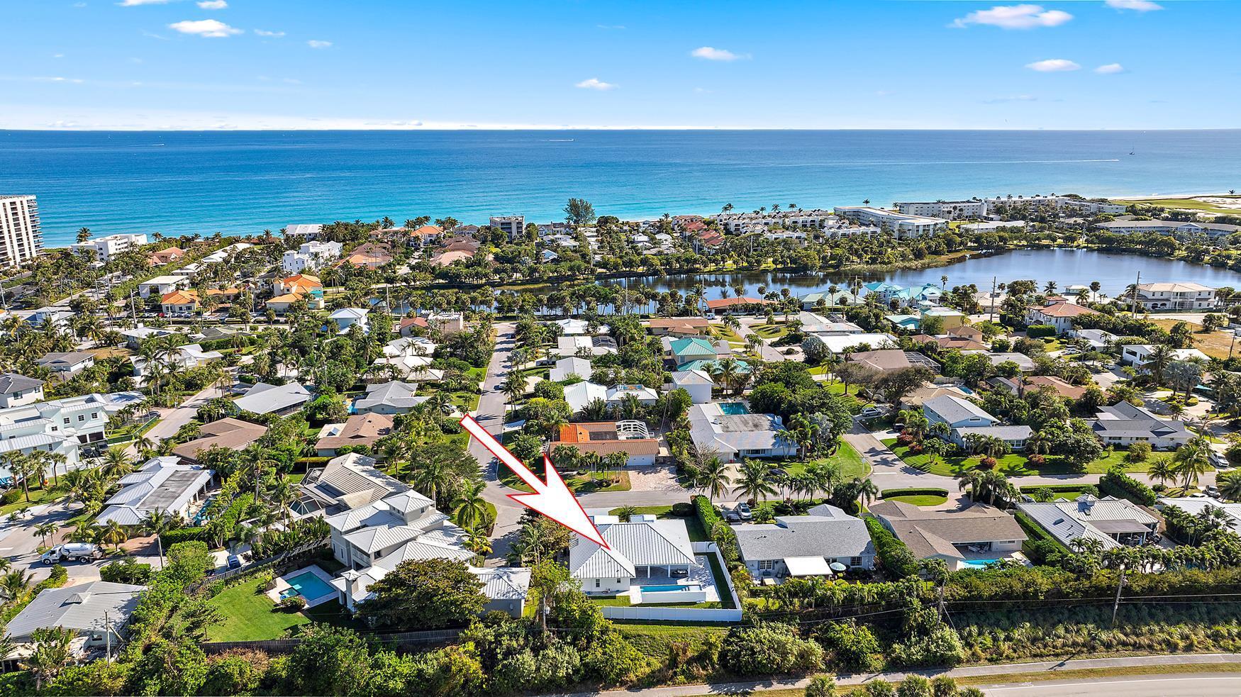 491 Sunset Way Juno Beach, FL 33408 - Photo 41 of 50 an aerial view of residential building and ocean