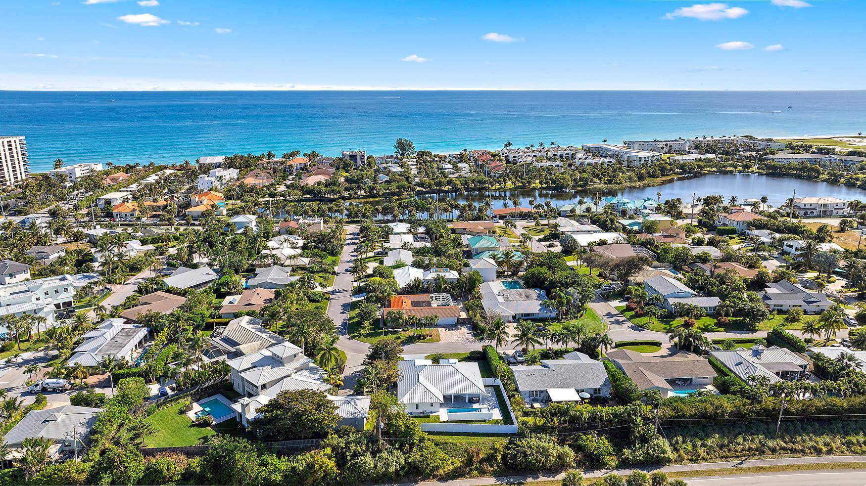 491 Sunset Way Juno Beach, FL 33408 - Photo 42 of 50 an aerial view of residential building and ocean