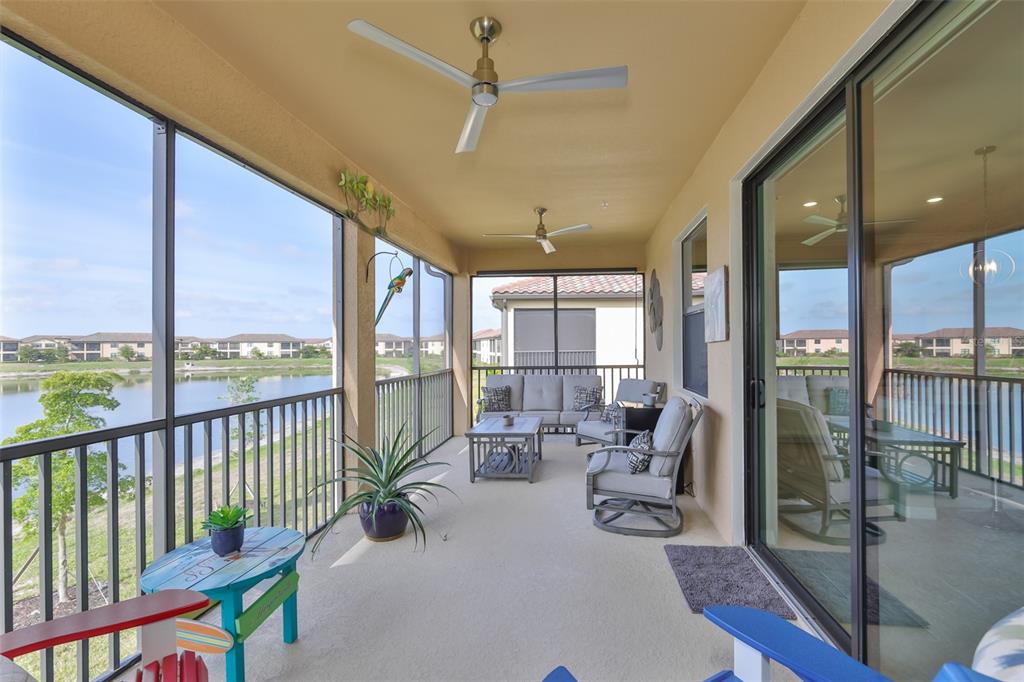 12405 Ghiberti Circle, Unit 202 Venice, FL 34293 - Photo 20 of 35 a building outdoor space with seating