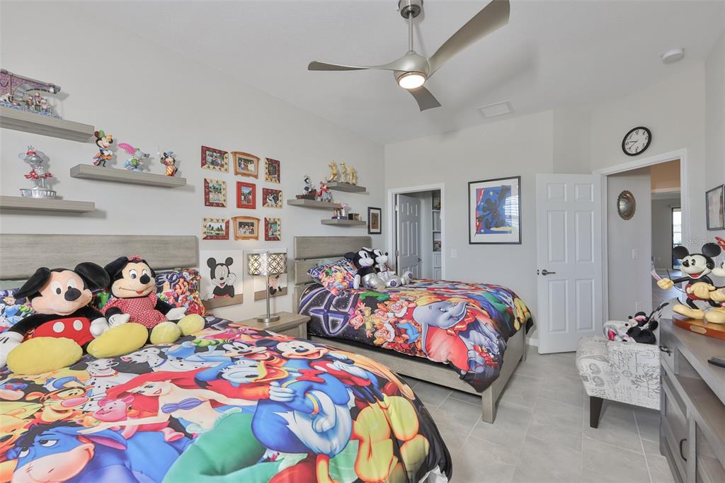 12405 Ghiberti Circle, Unit 202 Venice, FL 34293 - Photo 25 of 35 a bedroom with bed and a bed