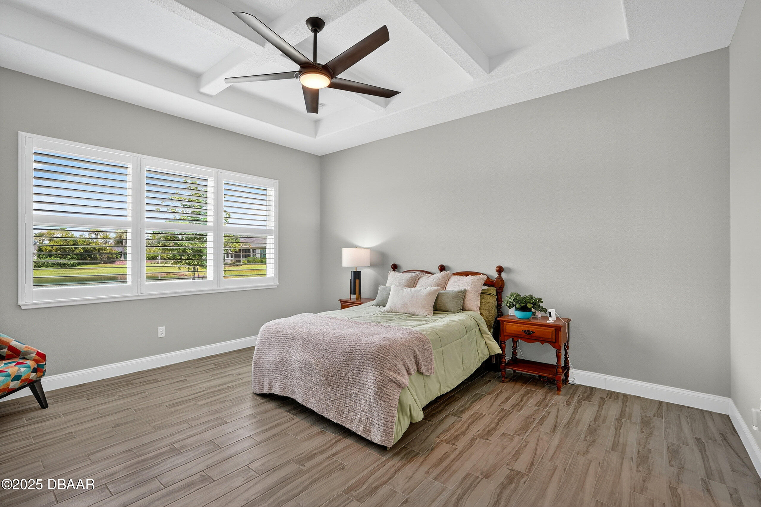 212 Fuchsia Street Daytona Beach, FL 32124 - Photo 20 of 54 a bedroom with a bed and a large window