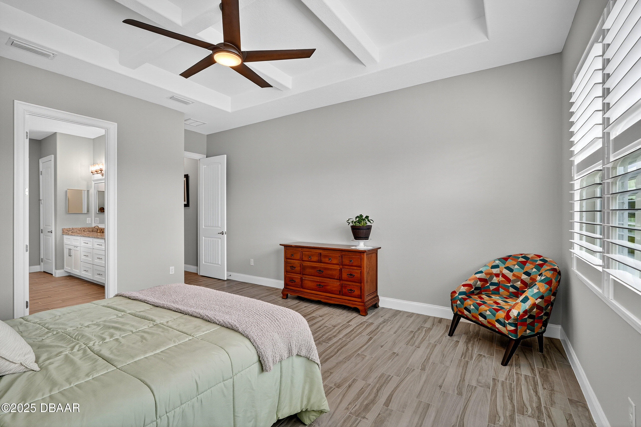 212 Fuchsia Street Daytona Beach, FL 32124 - Photo 23 of 54 a bedroom with a bed and a dresser