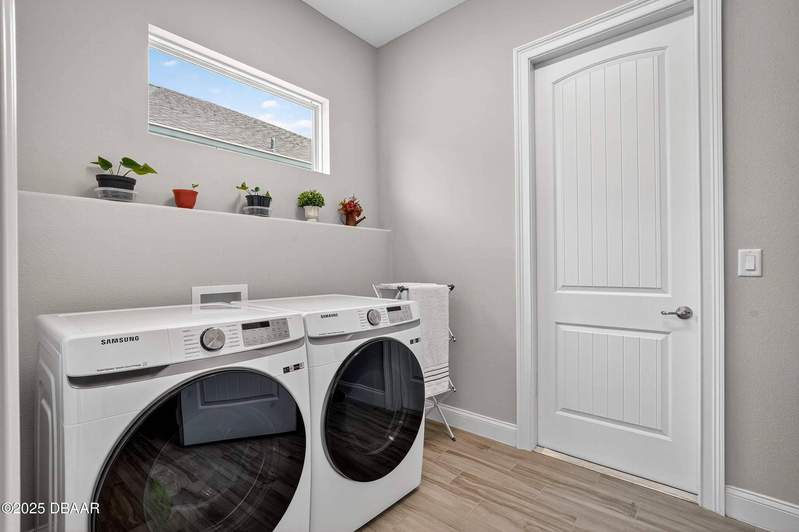 212 Fuchsia Street Daytona Beach, FL 32124 - Photo 28 of 54 a utility room with dryer and washer