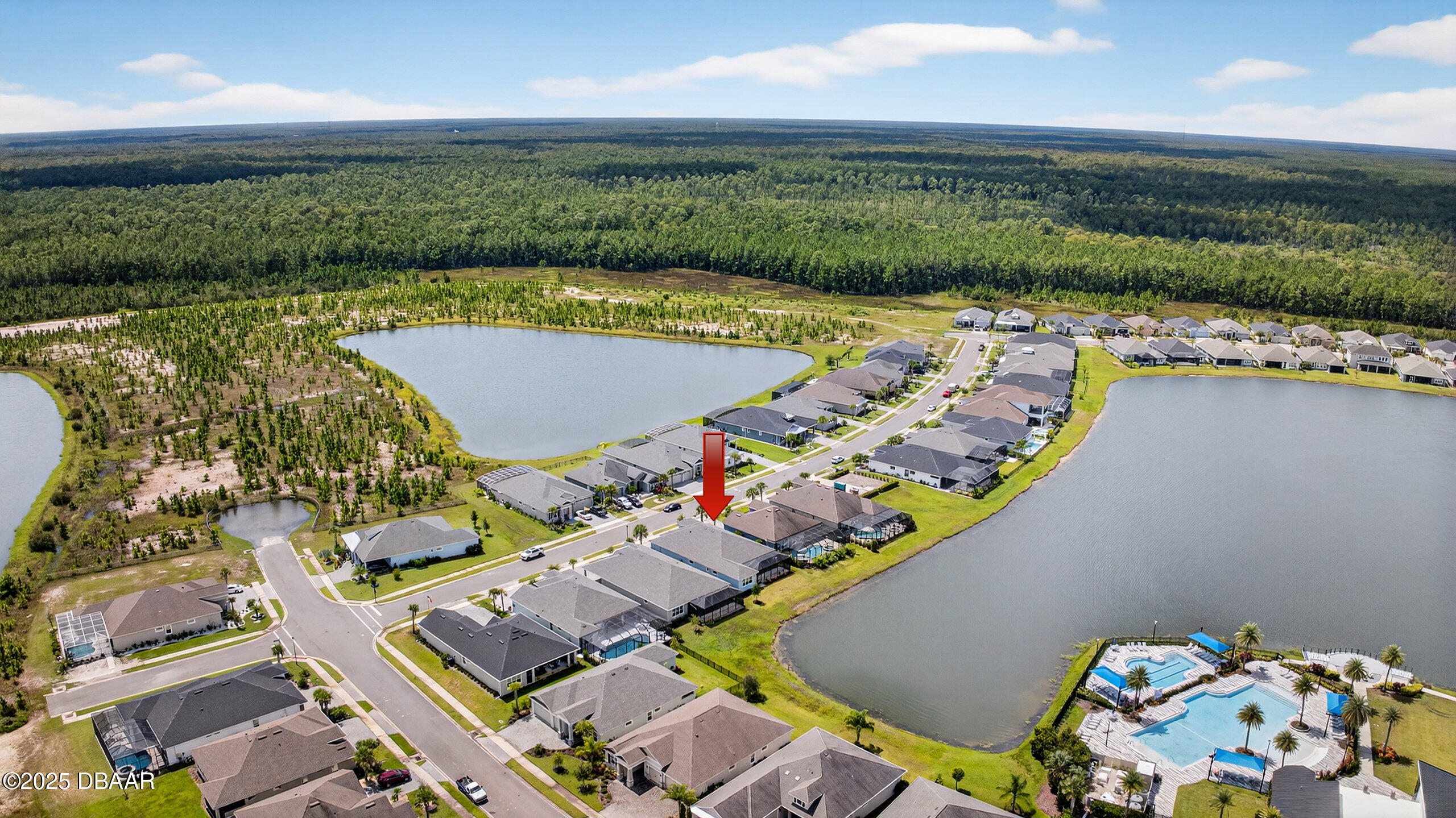 212 Fuchsia Street Daytona Beach, FL 32124 - Photo 40 of 54 an aerial view of a house with a ocean view