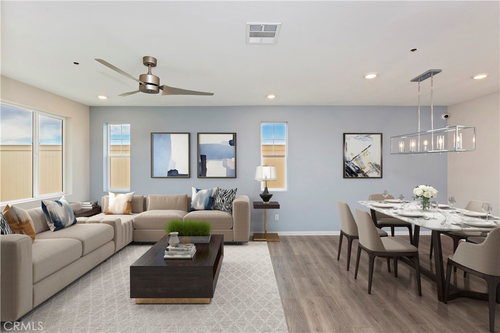 7181 Beck Drive Riverside, CA 92503 - Photo 3 of 7 a living room with furniture and a large window