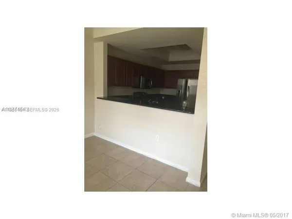 a picture of a bench in a room