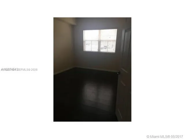 a black and white photo of a room