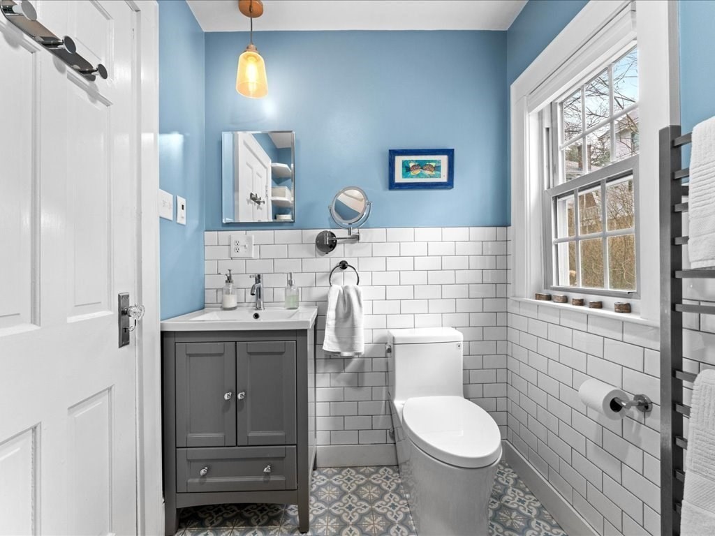 40 Lake Shore Road Boston, MA 02135 - Photo 22 of 39 a bathroom with a sink toilet and shower