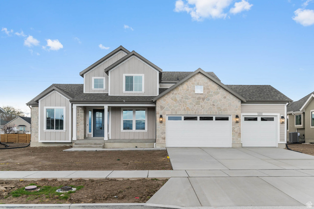 11737 South Halls Crk Road Draper, UT 84020 - Photo 1 of 1 Craftsman inspired home featuring a garage, a porch, concrete driveway, roof with shingles, and board and batten siding