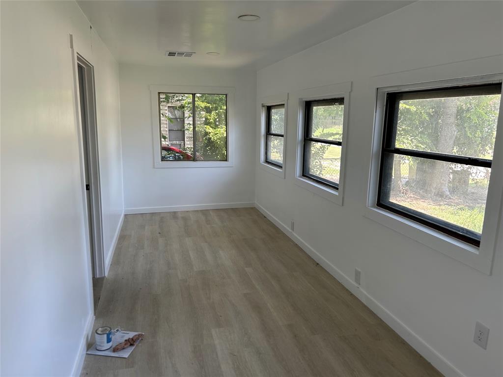 206 North 3rd Street Lott, TX 76656 - Photo 6 of 7 an empty room with windows