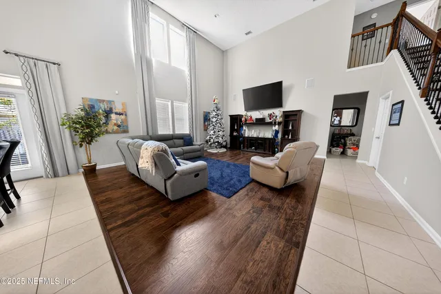 a living room with furniture or couch and a flat screen tv