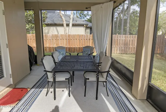 a view of a backyard with a patio