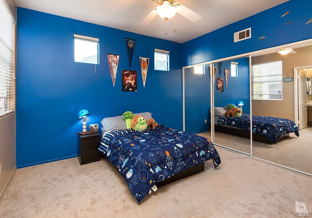 3854 Timberridge Road Moorpark, CA 93021 - Photo 22 of 33 a bedroom with a bed and a view of en suite
