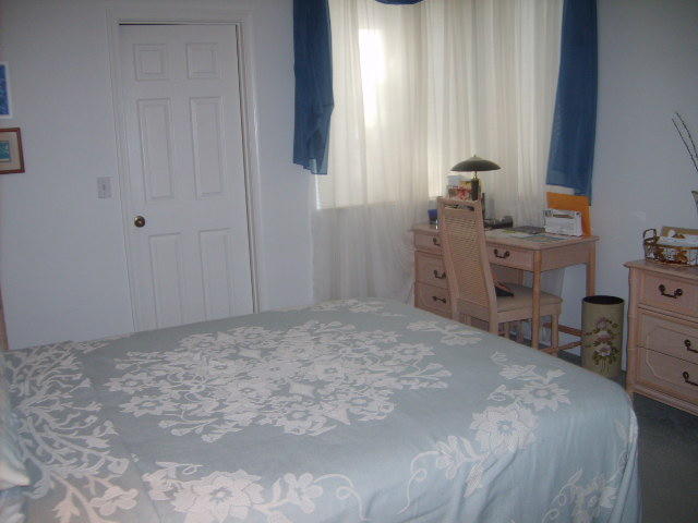 5344 Monterey Circle, Unit B Delray Beach, FL 33484 - Photo 16 of 26 SECOND BEDROOM WITH WALK IN CLOSET