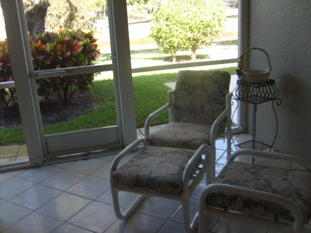 5344 Monterey Circle, Unit B Delray Beach, FL 33484 - Photo 20 of 26 PATIO WITH ROLL DOWN SHUTTERS