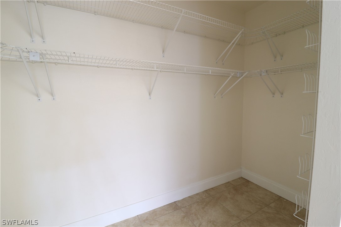 2102 Hibiscus Road Fort Myers, FL 33905 - Photo 11 of 23 a view of a room with shelf