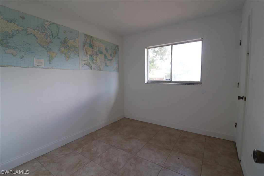 2102 Hibiscus Road Fort Myers, FL 33905 - Photo 14 of 23 an empty room with a window