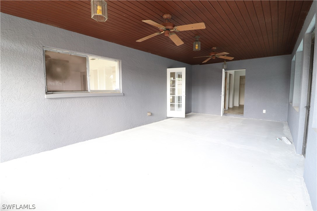 2102 Hibiscus Road Fort Myers, FL 33905 - Photo 19 of 23 a view of a livingroom with a ceiling fan and window