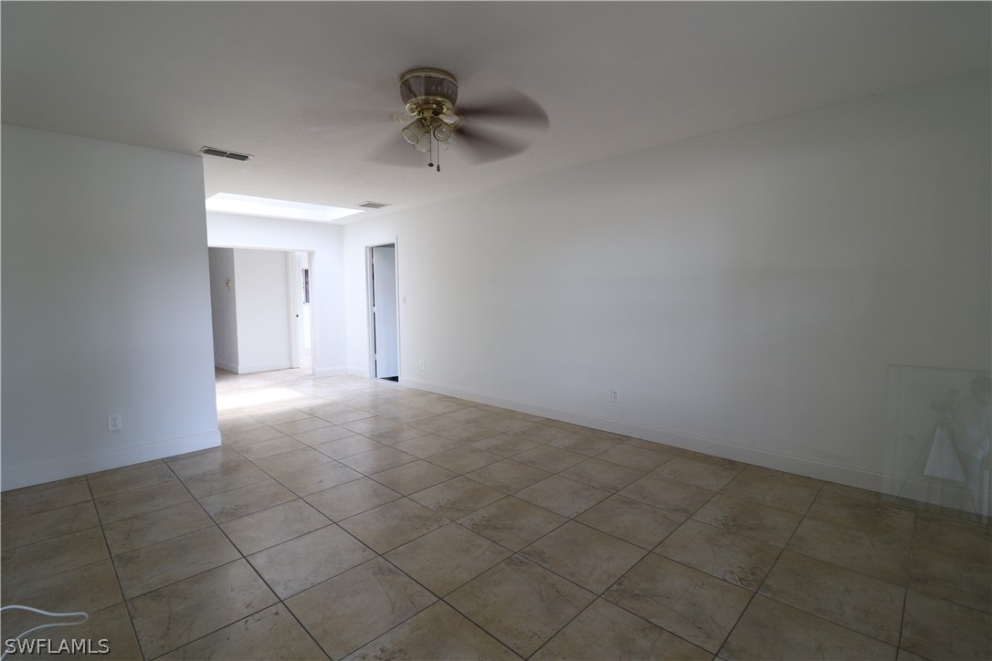 2102 Hibiscus Road Fort Myers, FL 33905 - Photo 4 of 23 a view of an empty room and a window