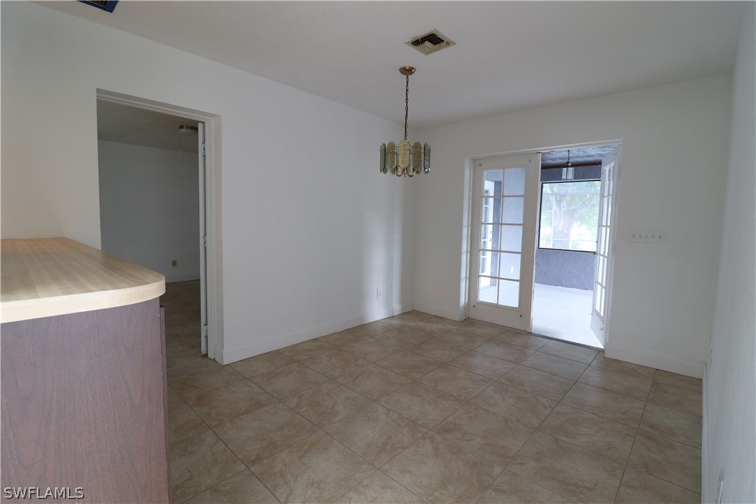 2102 Hibiscus Road Fort Myers, FL 33905 - Photo 8 of 23 a view of empty room with windows