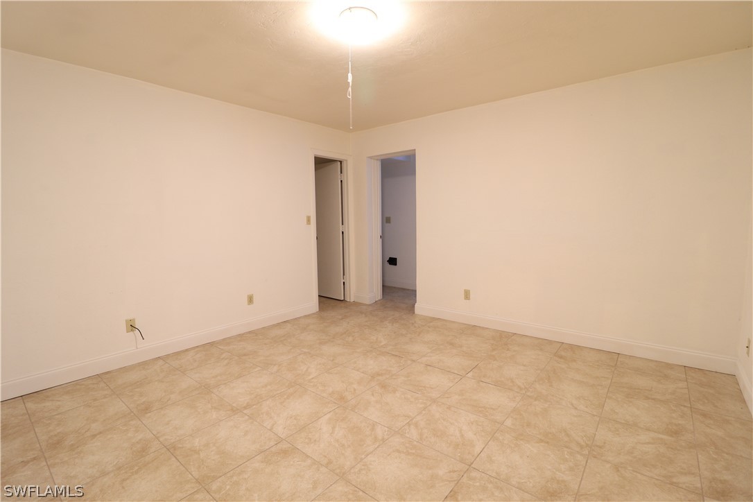 2102 Hibiscus Road Fort Myers, FL 33905 - Photo 9 of 23 an empty room with an entryway
