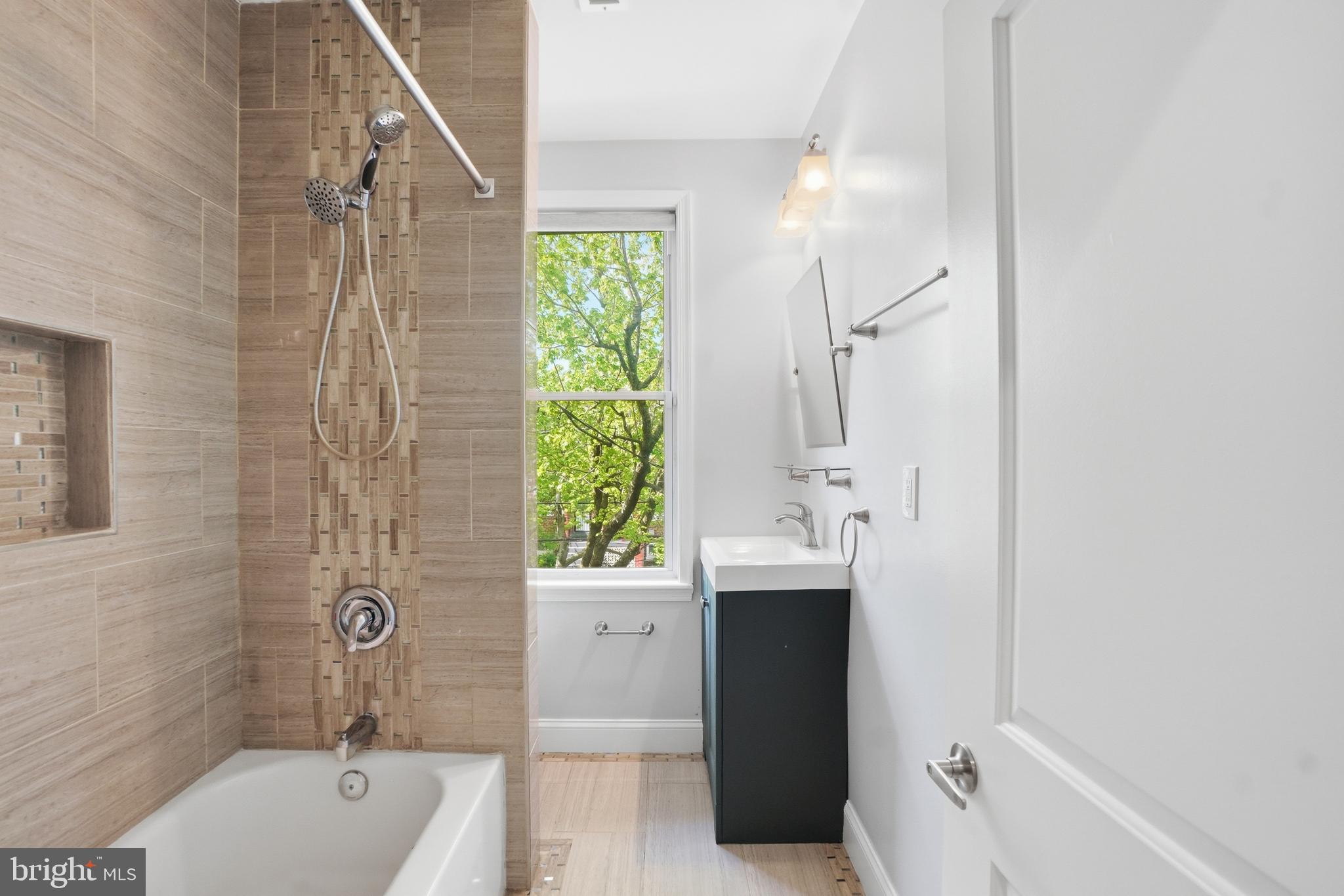 1118 Chicago Street Southeast Washington, DC 20020 - Photo 13 of 27 Serene bathroom with natural light.