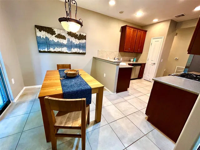 a workspace with furniture and wooden floor