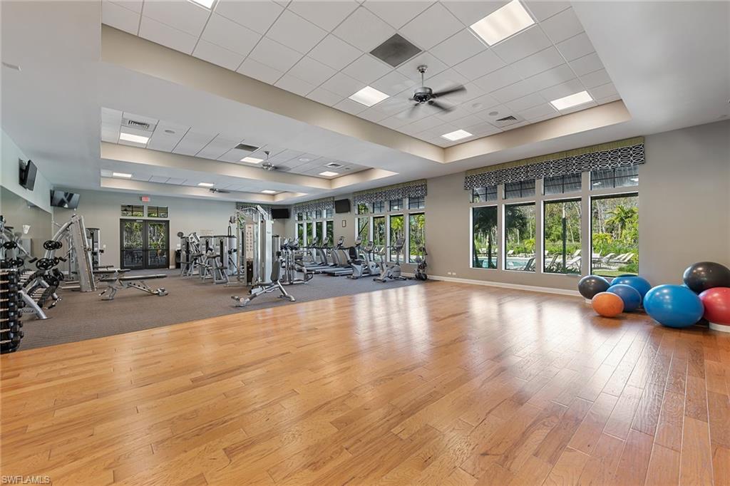 4359 Raffia Palm Circle Naples, FL 34119 - Photo 30 of 35 a view of a room gym equipment and a large window