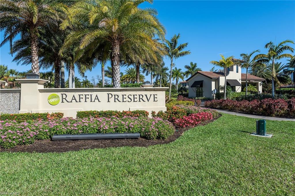 4359 Raffia Palm Circle Naples, FL 34119 - Photo 35 of 35 a view of outdoor space with garden and seating area