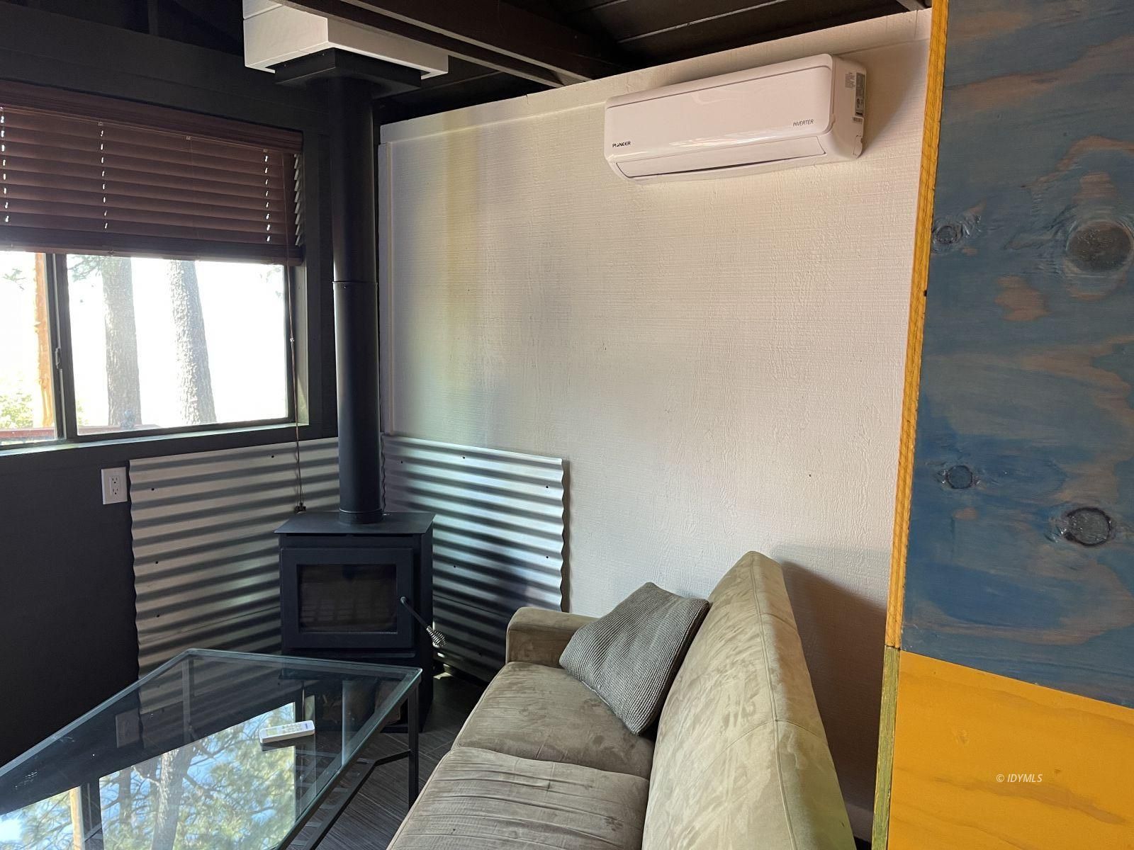 53155 Double View Drive Idyllwild, CA 92549 - Photo 35 of 47 Great Room / Wood Stove / Mini Split