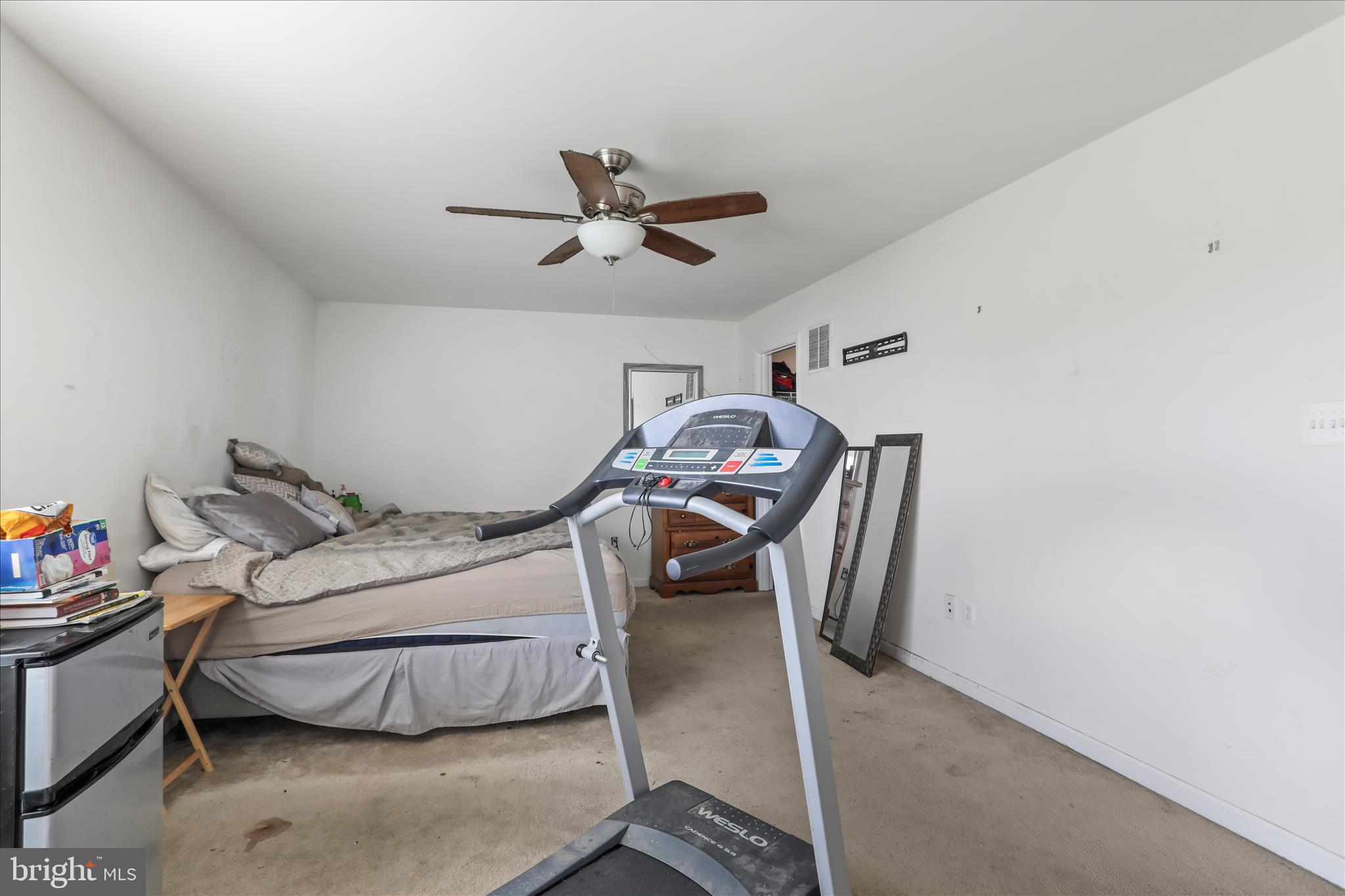 35 Sirocco Court Falling Waters, WV 25419 - Photo 26 of 45 a bedroom with a bed and cabinets