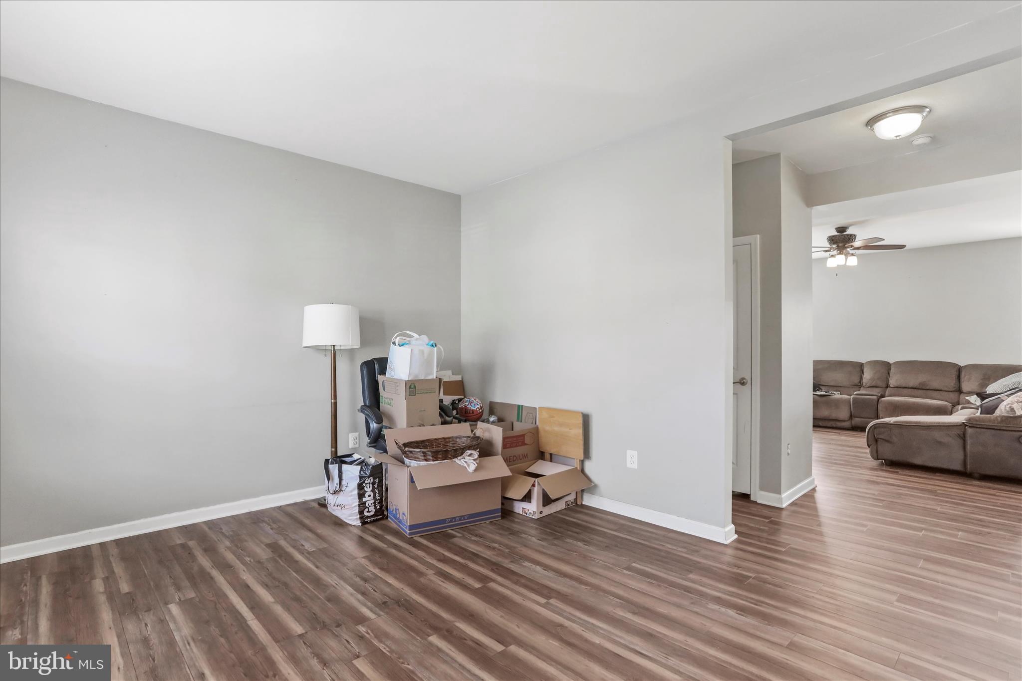 35 Sirocco Court Falling Waters, WV 25419 - Photo 4 of 45 a living room with furniture and a wooden floor