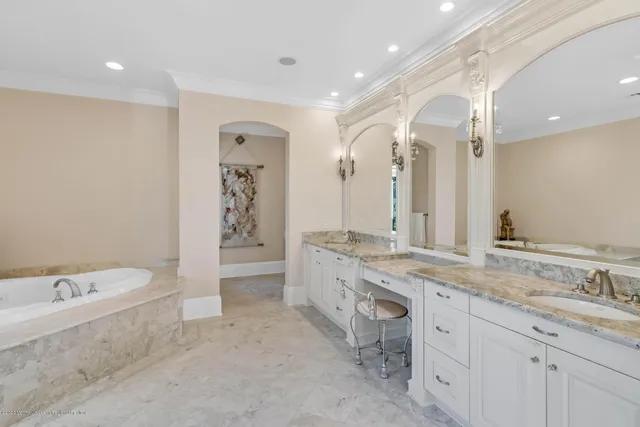 an aerial view of a house with a yard and garden