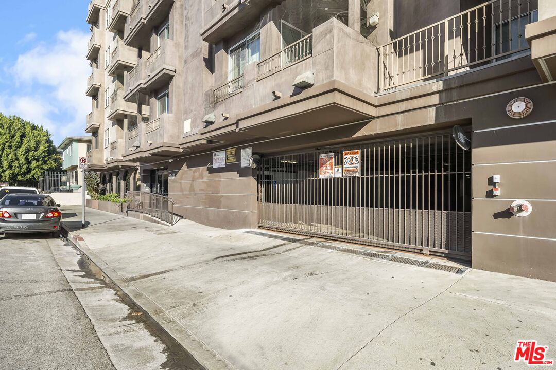 848 Irolo Street, Unit 105 Los Angeles, CA 90005 - Photo 3 of 18 a view of a building with a street