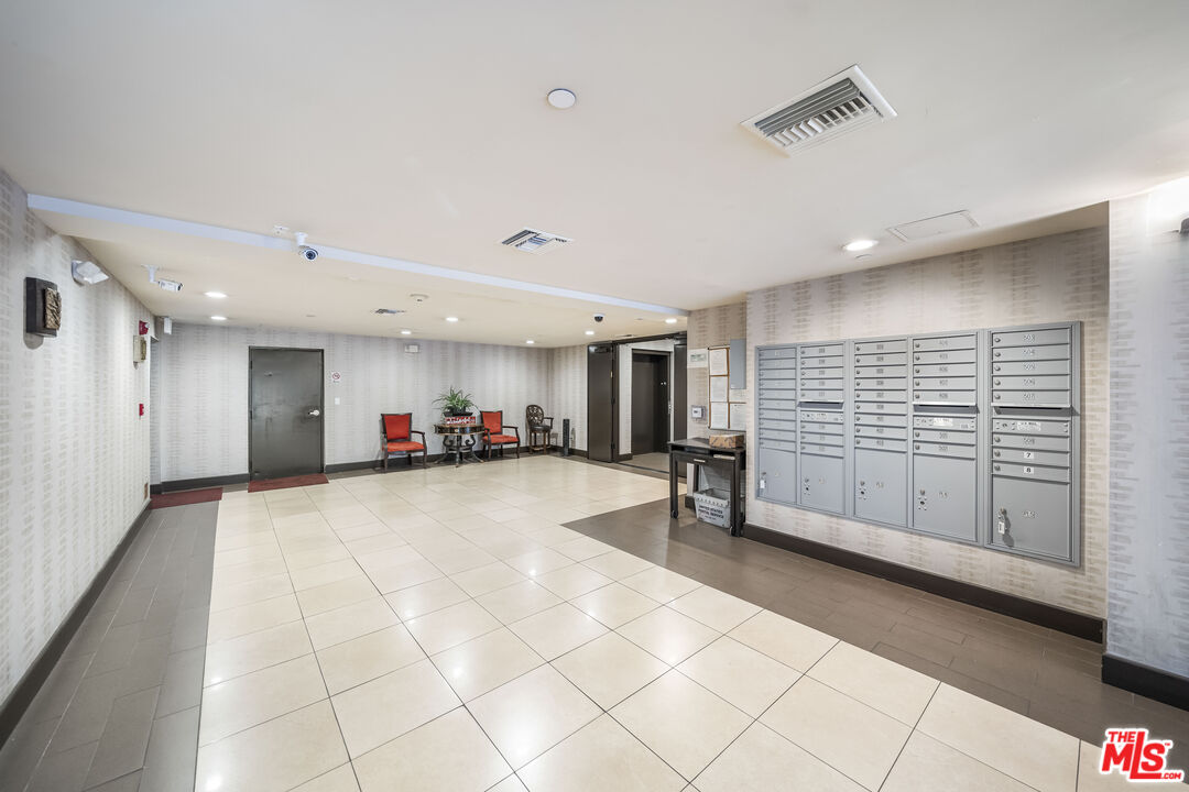 848 Irolo Street, Unit 105 Los Angeles, CA 90005 - Photo 6 of 18 a view of an empty room with a window