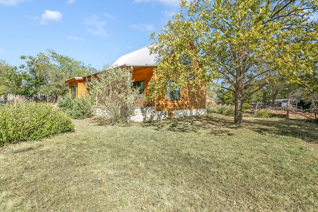 511 Bluebird Street Fredericksburg, TX 78624 - Photo 12 of 15 a view of outdoor space with trees all around
