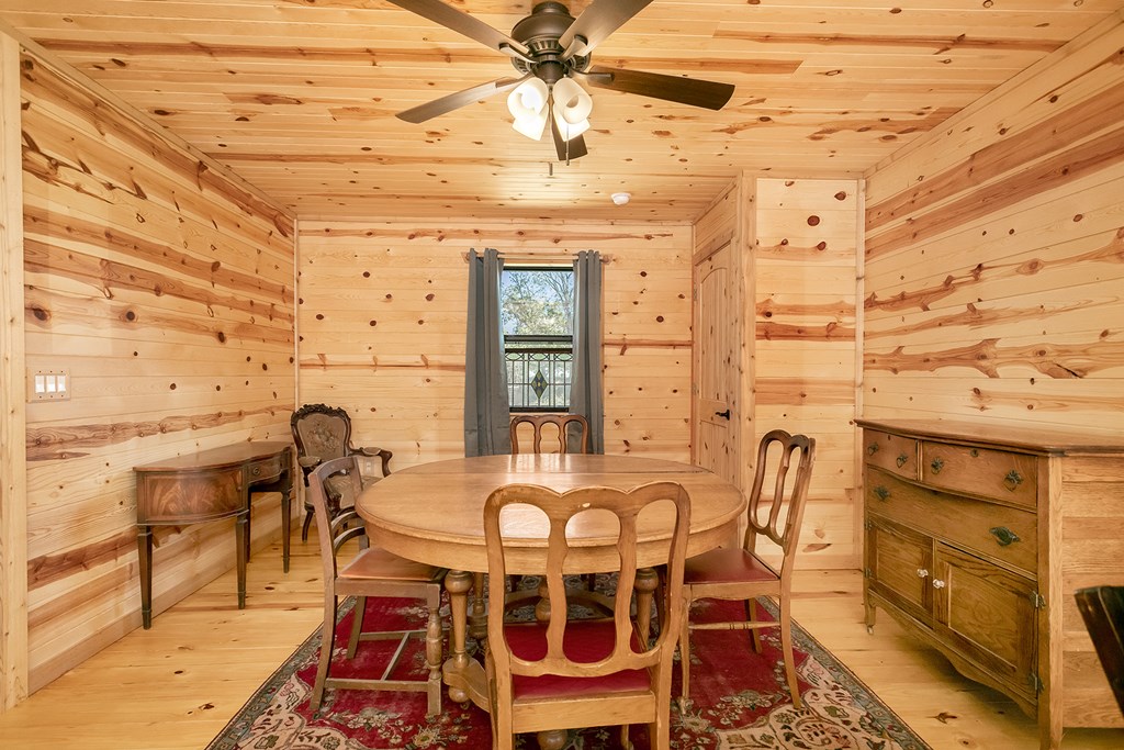 511 Bluebird Street Fredericksburg, TX 78624 - Photo 4 of 15 a view of a dining room with furniture and chandelier