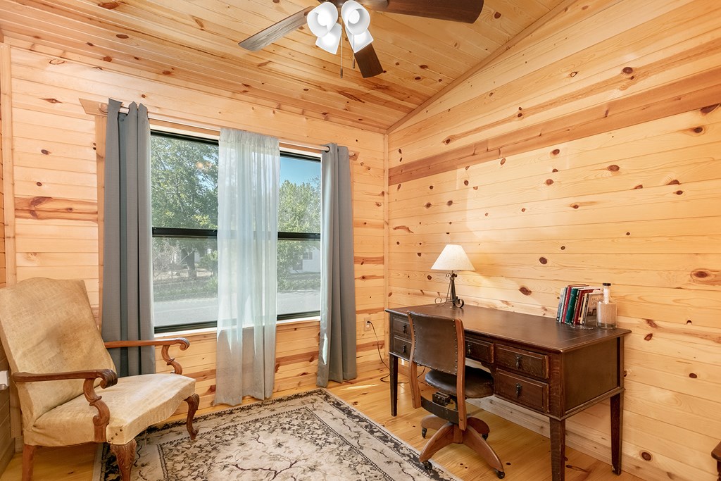 511 Bluebird Street Fredericksburg, TX 78624 - Photo 9 of 15 a living room with furniture and a window