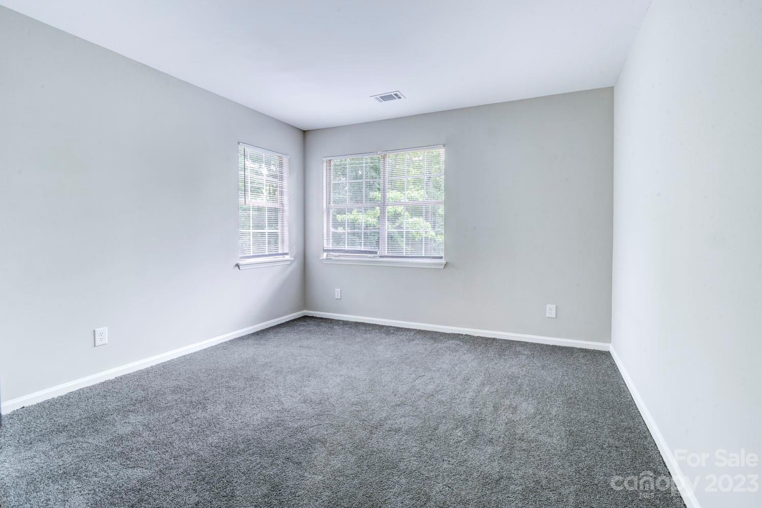 1811 Little Rock Road Charlotte, NC 28214 - Photo 20 of 20 an empty room with windows